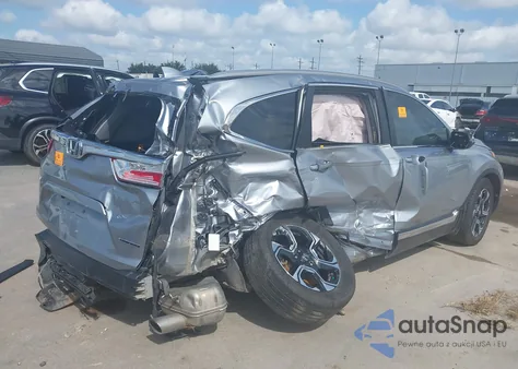 2018 Honda Cr-V Touring z USA, uszkodzony, nr VIN 7FARW1H93JE001455